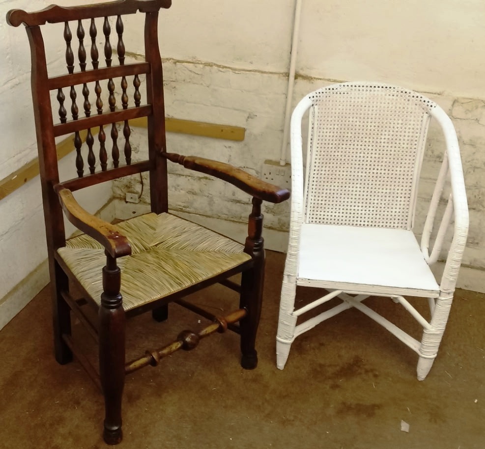 Renewed seat and repaired caning of the white-painted chair.